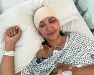 Leilah in her hospital bed, post-surgery.